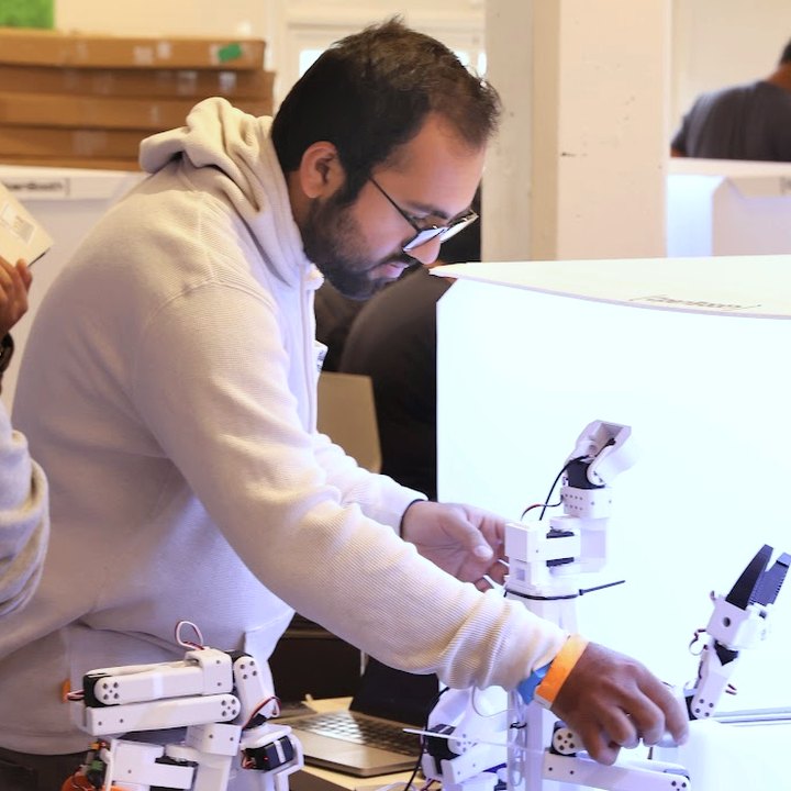 Harsh wiring up robot arms at a hackathon