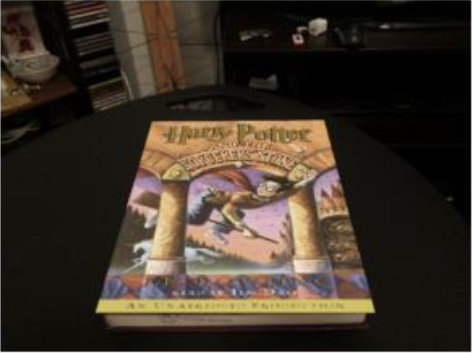 Warped cover overlaid on a textbook